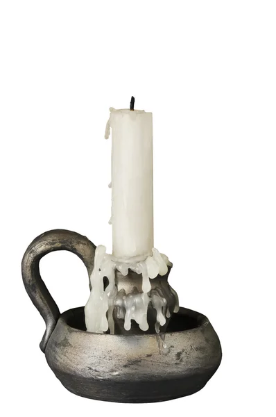 Svícen starobylého se svíčkou — Stock fotografie