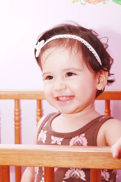 Adorable baby girl in nursery — Stock Photo, Image