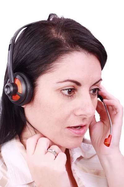 Jonge telefoniste spreken op een headset — Stockfoto