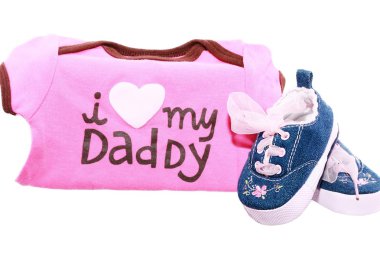 Baby shoes and suits with a message for the fathers day clipart