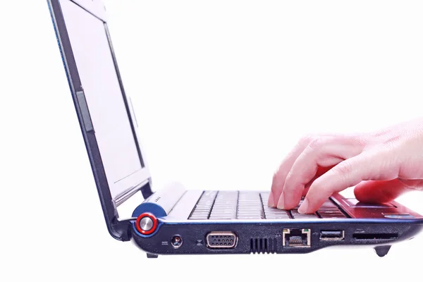 Image of hand on the laptop keyboard. Isolated on white background — Stock Photo, Image