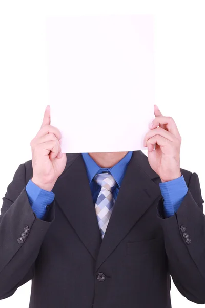 A businessman with a blank paper in his face isolated on white — Stock Photo, Image
