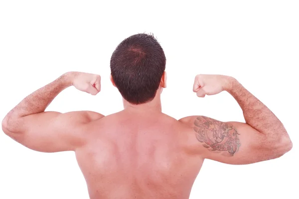 Joven sexy hombre mostrando su bíceps aislado en blanco — Foto de Stock