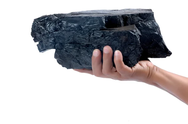Erkek el tutarak büyük bir parça kömür — Stok fotoğraf