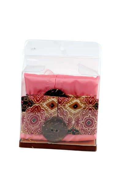 Uma caixa de luvas de tecidos estampado batik pano — Fotografia de Stock
