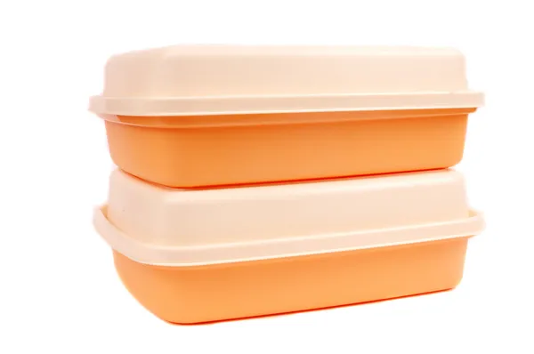 Pilha de recipientes de plástico de armazenamento laranja — Fotografia de Stock