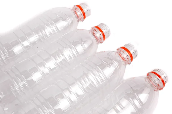Vier geöffnete Plastikflaschen — Stockfoto