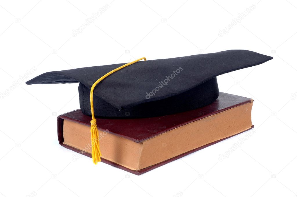 Graduate cap and old book
