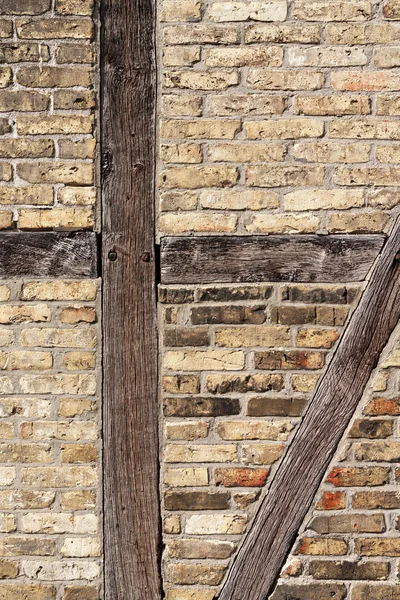 Oude bakstenen muur met kader — Stockfoto