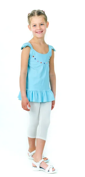 Фото милої маленької дівчинки в кольоровому одязі на білому тлі — стокове фото