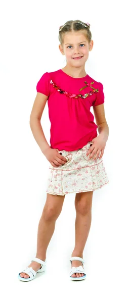 Foto de menina bonito em roupas coloridas no fundo branco — Fotografia de Stock