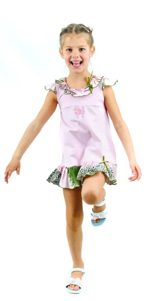 Foto av söt liten flicka i färgade kläder på vit bakgrund — Stockfoto