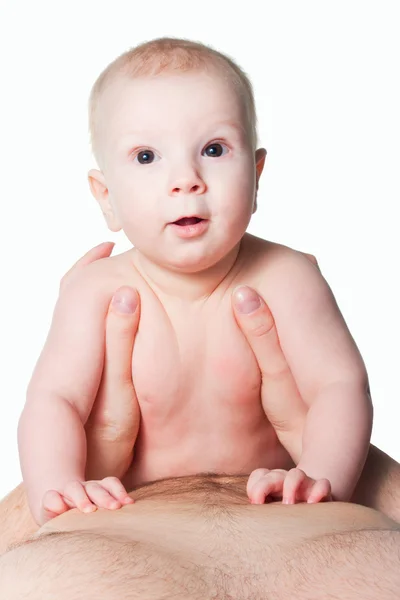 Baby boy in hands of adult on white — Stock Photo, Image