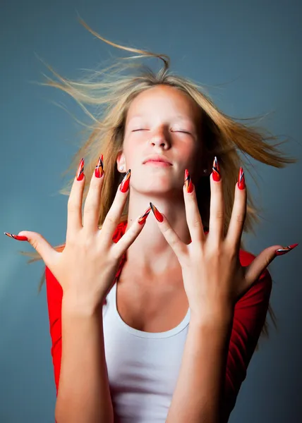 Girl with fashionable design of nails — Stock Photo, Image