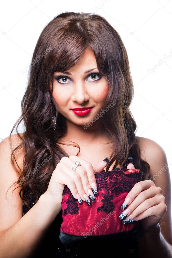 Charming brunette with theatrical red handbag on white