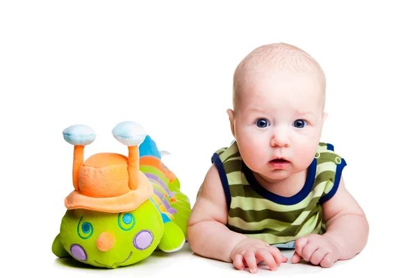 Lindo bebé con oruga de juguete en blanco aislado — Foto de Stock