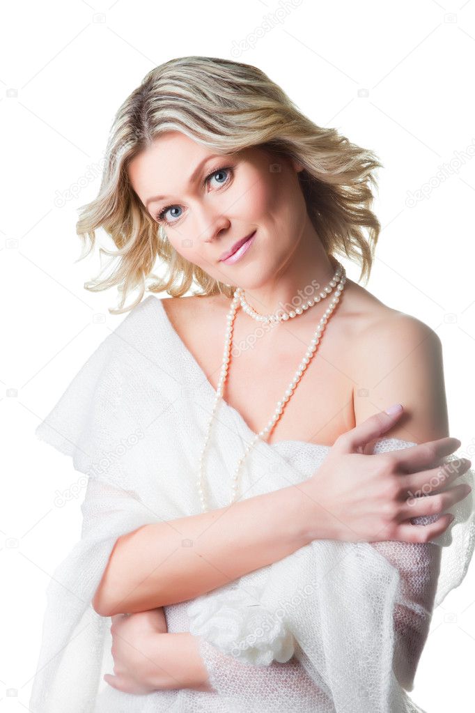 Woman wrapped up in woolen shawl on isolated white