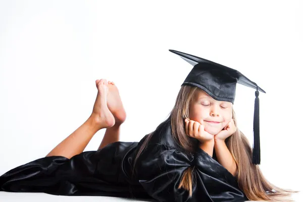 Snění v maturitní šaty na izolované bílá holčička — Stock fotografie