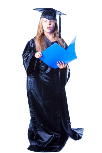 Girl with bachelor hat and graduation gown on isolated white — Stock Photo, Image