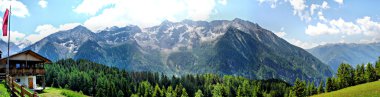 Alpine hut in the mountains clipart