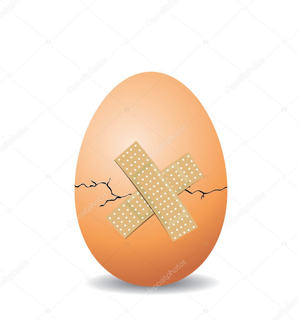 Cracked nest egg isolated on white