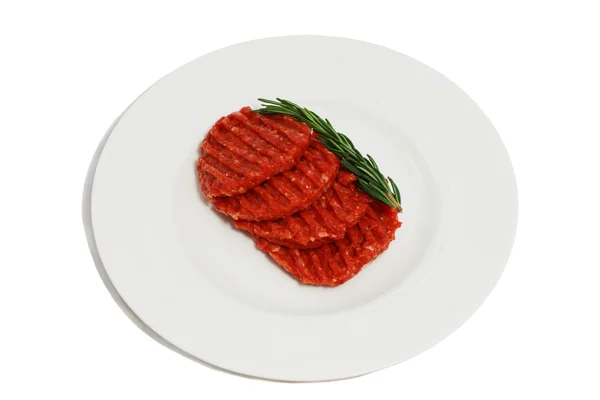 Rått kött med rosmarin — Stockfoto