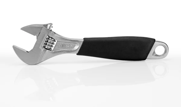 Wrench with a black handle. — Stock Photo, Image