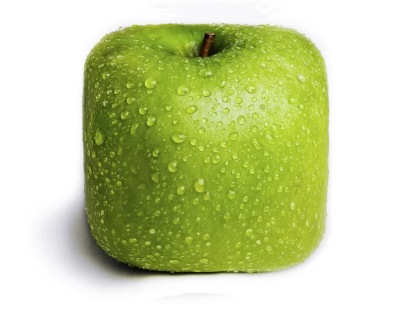 Na białym tle placu zielonym jabłkiem — Zdjęcie stockowe