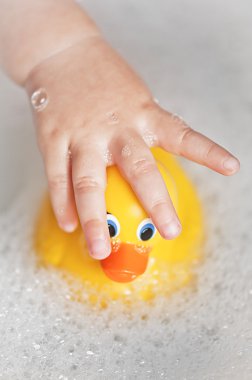 Toddler bathtime with a rubber ducky clipart