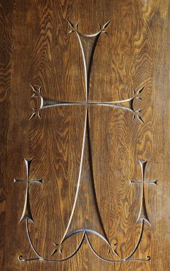 Wood carving of three crosses clipart