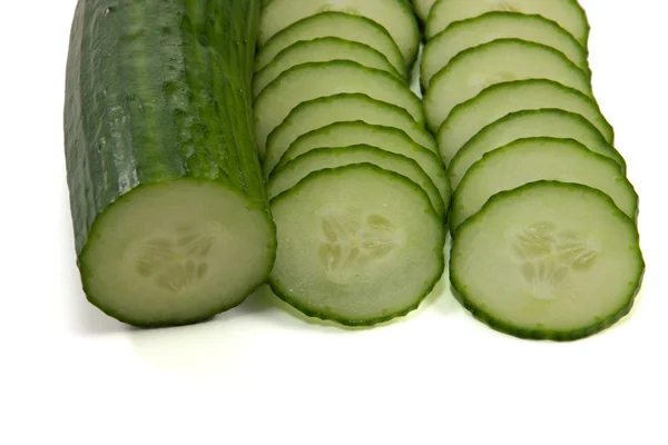 Cucmbers sliced and whole — Stock Photo, Image