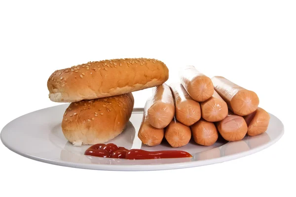 Sausages with bread and ketchup — Stock Photo, Image