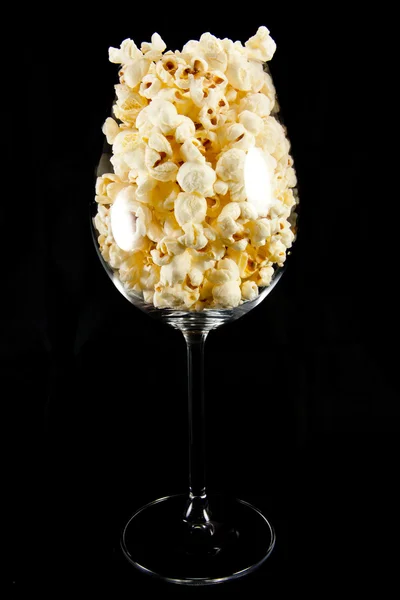 Wine glass with popcorn — Stock Photo, Image