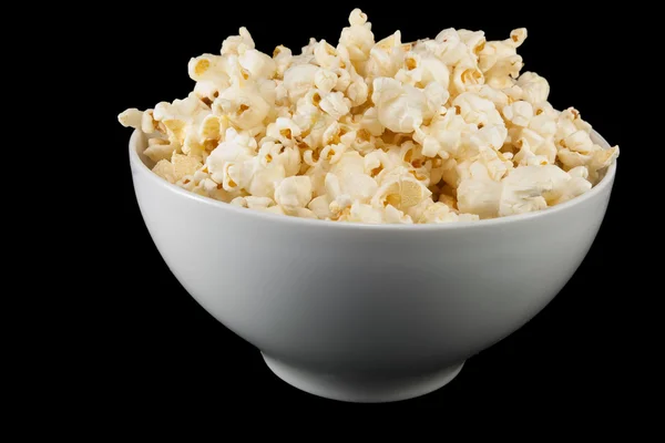 Popcorn in a white bowl — Stock Photo, Image