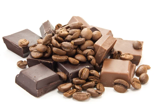 Heap of coffe beans and chocolate on white — Stock Photo, Image