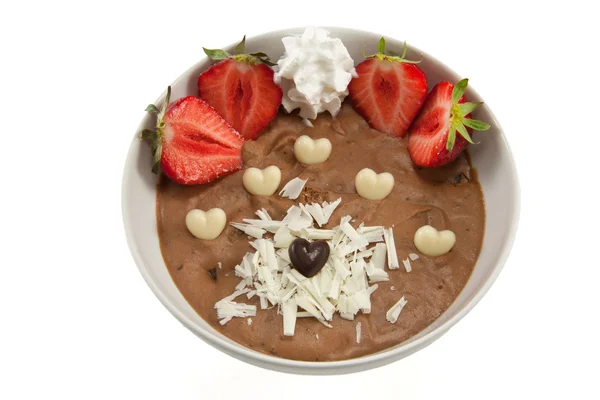 Mousse with strawberries and chocolate hearts — Stock Photo, Image