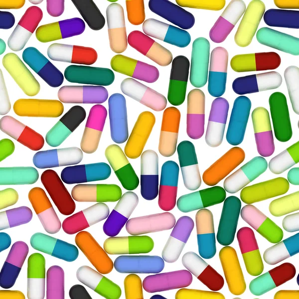 A lot of many-colored capsules on white background — Stock Photo, Image