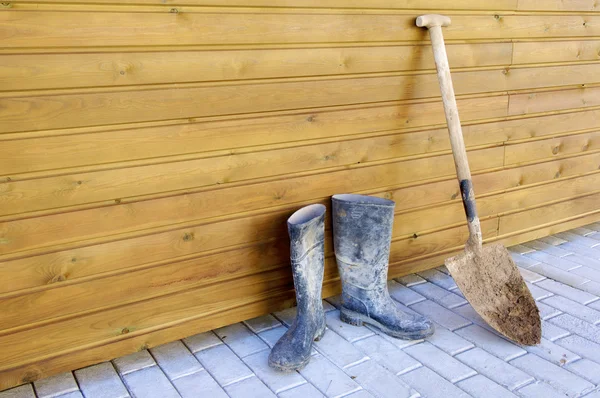 Shovel and gumboots — Stock Photo, Image