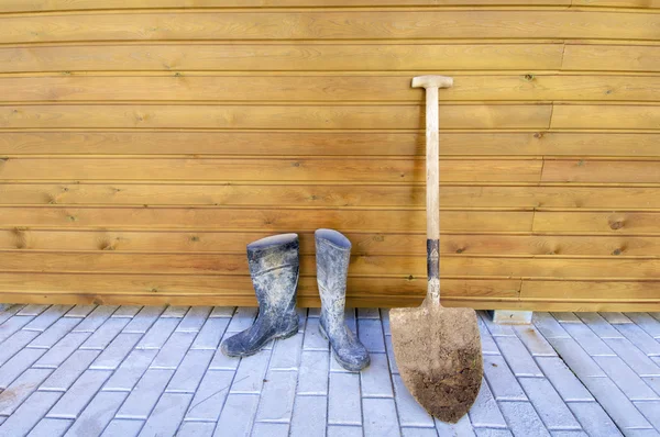 Shovel and gumboots — Stock Photo, Image