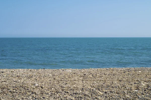 stock image Pebble beach and blue sky