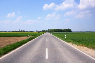 Road betwee fields clipart