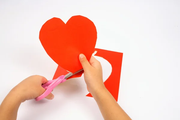 Cutting heart shape — Stock Photo, Image