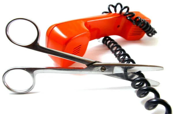 Telephone tube and scissors — Stockfoto