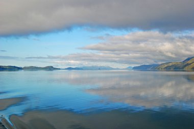 Prince William Sound in morning calm clipart