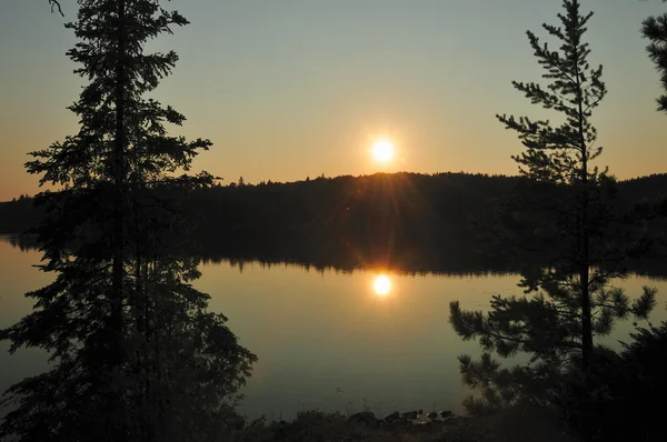 Sunset and reflections — Stock Photo, Image