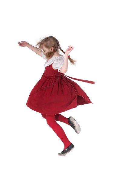 Смішна дівчина біжить з кісками — стокове фото