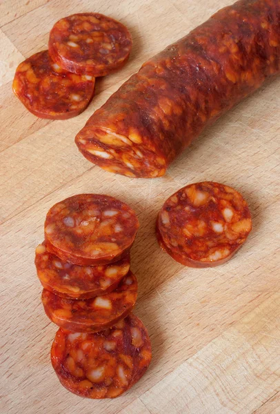 Chorizo, slicing sausage — Stock Photo, Image