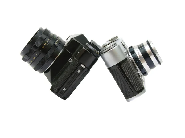 Duas câmeras analógicas em um fundo branco fechar — Fotografia de Stock
