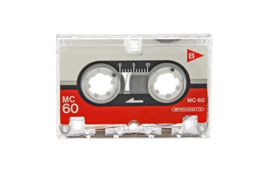 Old audio microcassette closeup on white background clipart