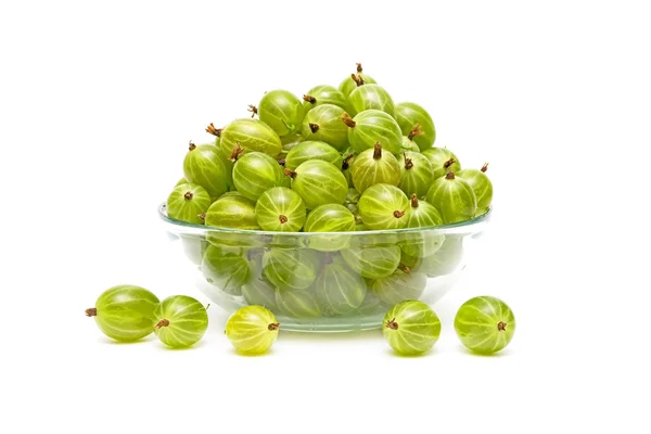 Gooseberries in a glass bowl on a white background — Stock Photo, Image
